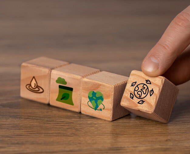 wooden blocks showing different sustainable development goals, aligned to Greenitio's vision and mission
